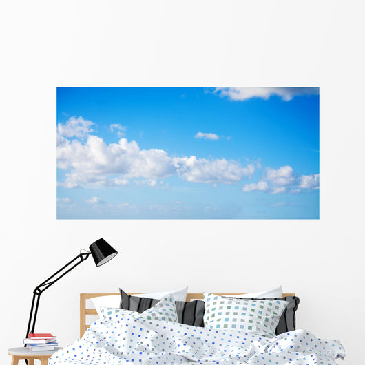 white clouds in the blue sky Wall Mural