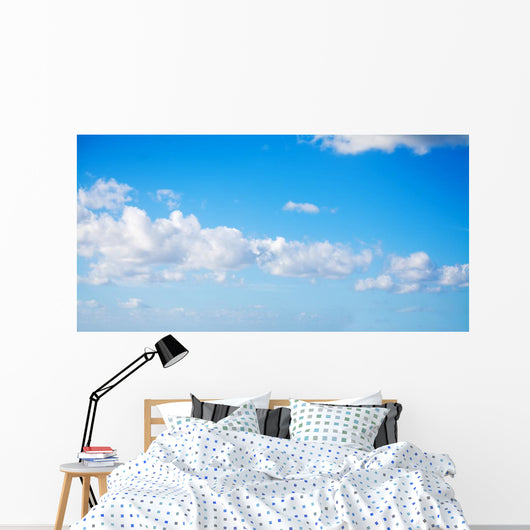 white clouds in the blue sky Wall Mural