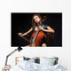 beautiful female musician playing a cello. Wall Mural