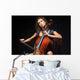 beautiful female musician playing a cello. Wall Mural