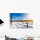 Cross-country skiing in Scandinavian winter landscape at sunset Wall Mural