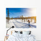Cross-country skiing in Scandinavian winter landscape at sunset Wall Mural