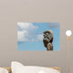 Maori totem against blue sky Wall Mural