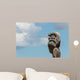 Maori totem against blue sky Wall Mural