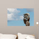 Maori totem against blue sky Wall Mural