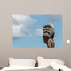 Maori totem against blue sky Wall Mural