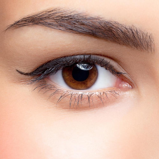 Woman eye make-up Wall Mural