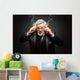 Businessman with burning Mobile Phones Wall Mural