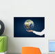 Hand holding Planet. Wall Mural