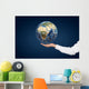 Hand holding Planet. Wall Mural