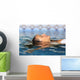 Profile of a beauty relaxed woman face floating in water Wall Mural