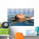 Profile of a beauty relaxed woman face floating in water Wall Mural