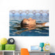 Profile of a beauty relaxed woman face floating in water Wall Mural