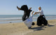 Aikido on the beach Wall Mural