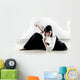 beautiful woman wearing a hakama practicing Aikido Wall Mural