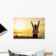 Successful sporty woman with arms up Wall Mural