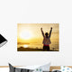 Successful sporty woman with arms up Wall Mural