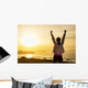 Successful sporty woman with arms up Wall Mural