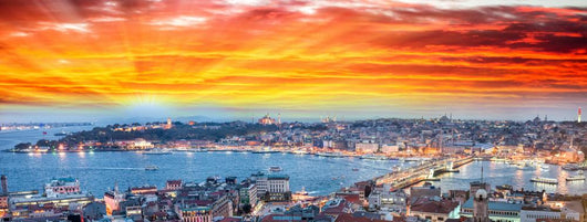 Wonderful panoramic view of Istanbul at dusk across Golden Horn Wall Mural