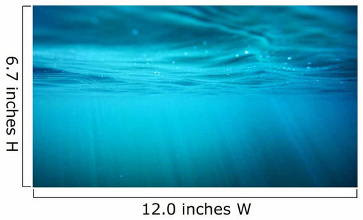Underwater view with sun beams in turquoise water Wall Mural