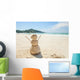 snowman made of sand on a background of the tropical warm sea Wall Mural