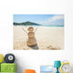 snowman made of sand on a background of the tropical warm sea Wall Mural
