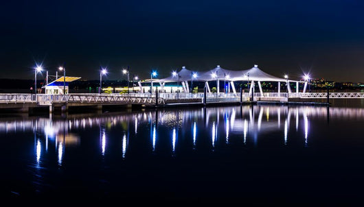 Pier reflecting in the Potomac River at night, in National Harbo Wall Mural