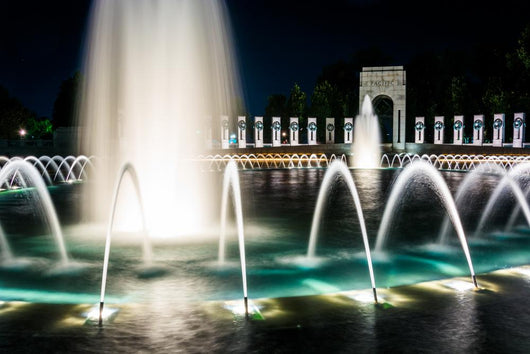 The National World War II Memorial Fountains at night at the Nat Wall Mural