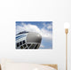 The nose of cargo aircraft, blue sky with white clouds Wall Mural