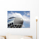 The nose of cargo aircraft, blue sky with white clouds Wall Mural