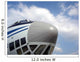 The nose of cargo aircraft, blue sky with white clouds Wall Mural