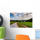 Cloudy sky over a dirt road and farm fields in rural York County Wall Mural