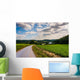 Cloudy sky over a dirt road and farm fields in rural York County Wall Mural
