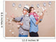 Young couple in a Photo Booth party with gesture face Wall Mural