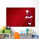 Composite image of santa claus is playing golf Wall Mural