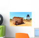 House with water tank in a village in Africa Wall Mural