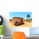House with water tank in a village in Africa Wall Mural
