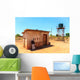House with water tank in a village in Africa Wall Mural