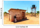 House with water tank in a village in Africa Wall Mural