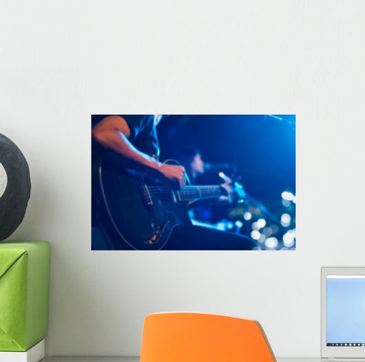 Guitarist on stage for background, soft and blur concept Wall Mural
