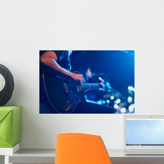 Guitarist on stage for background, soft and blur concept Wall Mural