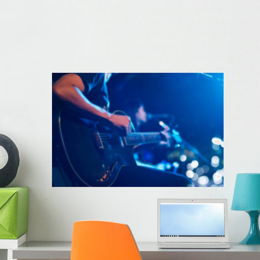 Guitarist on stage for background, soft and blur concept Wall Mural