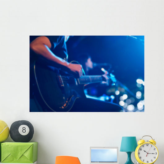 Guitarist on stage for background, soft and blur concept Wall Mural