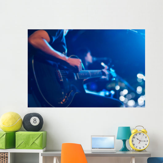Guitarist on stage for background, soft and blur concept Wall Mural