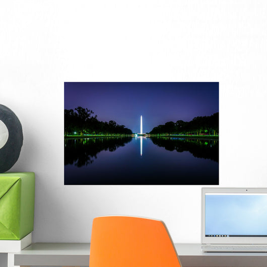 The Washington Monument reflecting in the Reflection Pool at nig Wall Mural