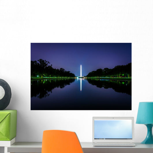 The Washington Monument reflecting in the Reflection Pool at nig Wall Mural