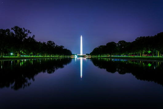 The Washington Monument reflecting in the Reflection Pool at nig Wall Mural