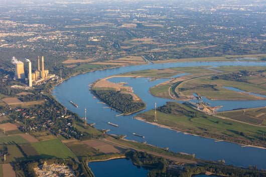 Rhine River bend Orsoy with agricultural, industrial and residen Wall Mural
