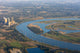 Rhine River bend Orsoy with agricultural, industrial and residen Wall Mural