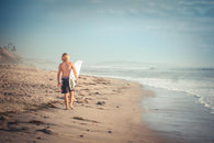 Man Surfer Walking along Wall Decal